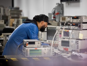 technician working on computer equipment