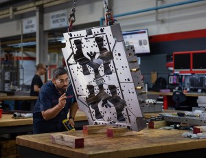men working on electrical equipment