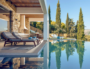 Image of a clean swimming pool with bench on the side