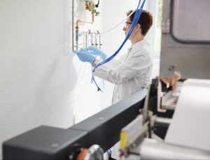 Scientist setting up equipment in a lab