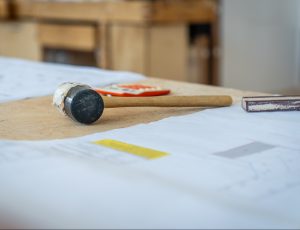 wooden gavel on a desk | Platinum Equity