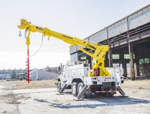 drilling equipment attached to a pick up track