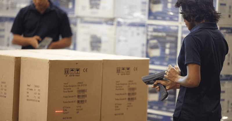 woman scanning a box