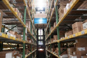 forklift in a storage facility | Platinum Equity