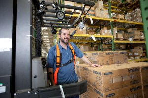 man in a storage warehouse | Platinum Equity