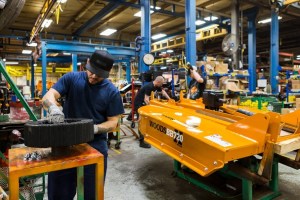several men working in a factory