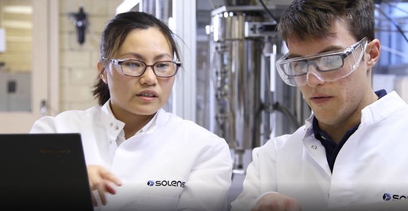2 solenis employees wearing clean white uniform