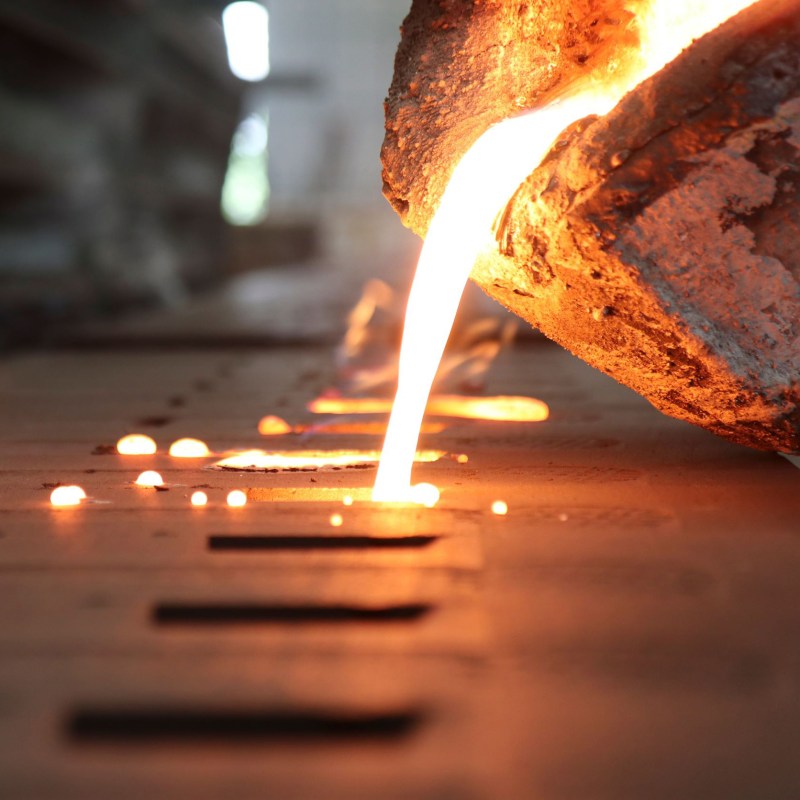 molten metal pouring in a container