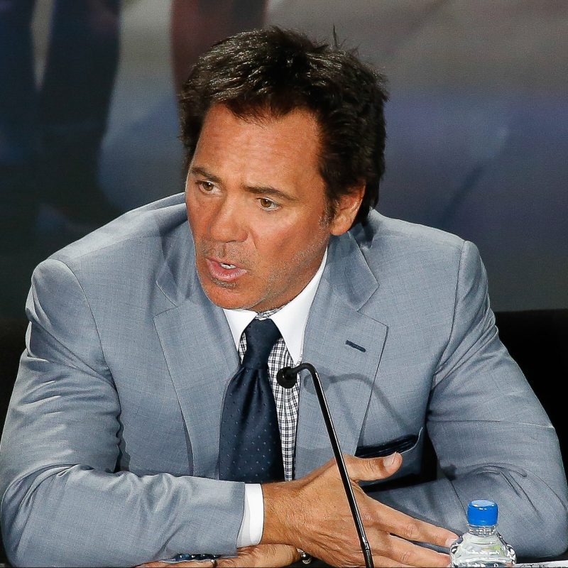 Image of Tom Gores speaking on the mic
