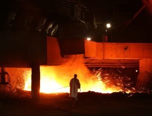 darker image with large sparks caused by industrial equipment