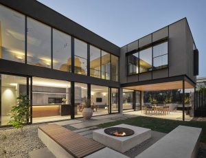 Modern house from the outside with sharp lines and a lot of glass
