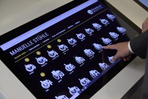 screen showing different types of wheel chair in a catalogue